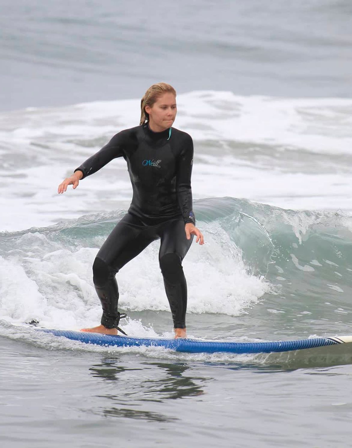 new student paddling in the water